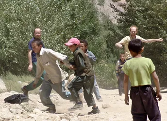 aid-workers-play-with-afghan-kids_178535107_o.jpg